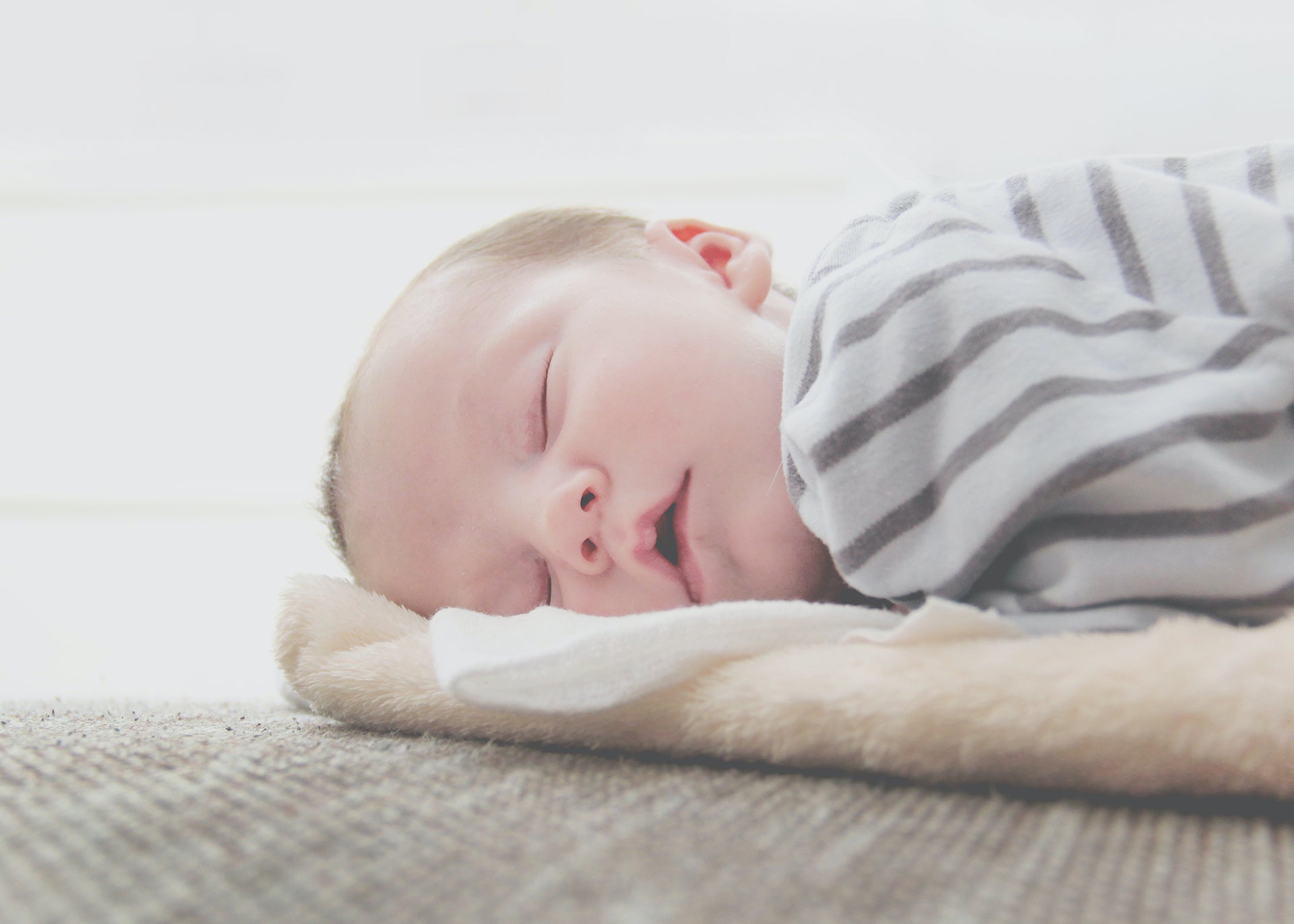 The Benefits of Using a Newborn Baby Sleeping Pillow